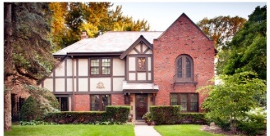 Wood casement windows keep appearances for historic Tudor home