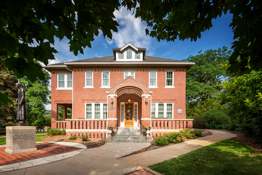 Grady Father Flanagan House in Omaha with white Pella wood windows