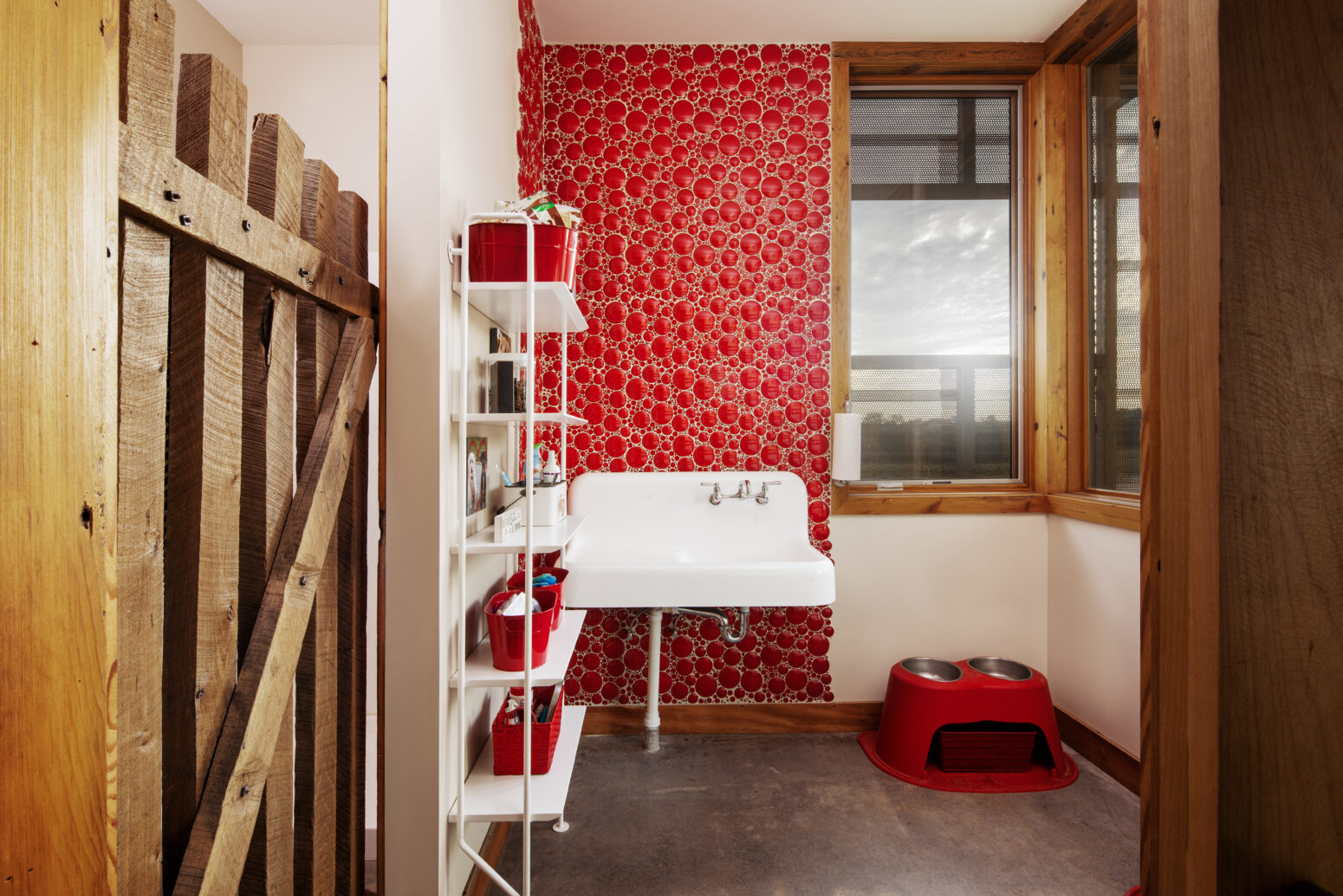 Stained Pella Casement Window in Red Bathroom