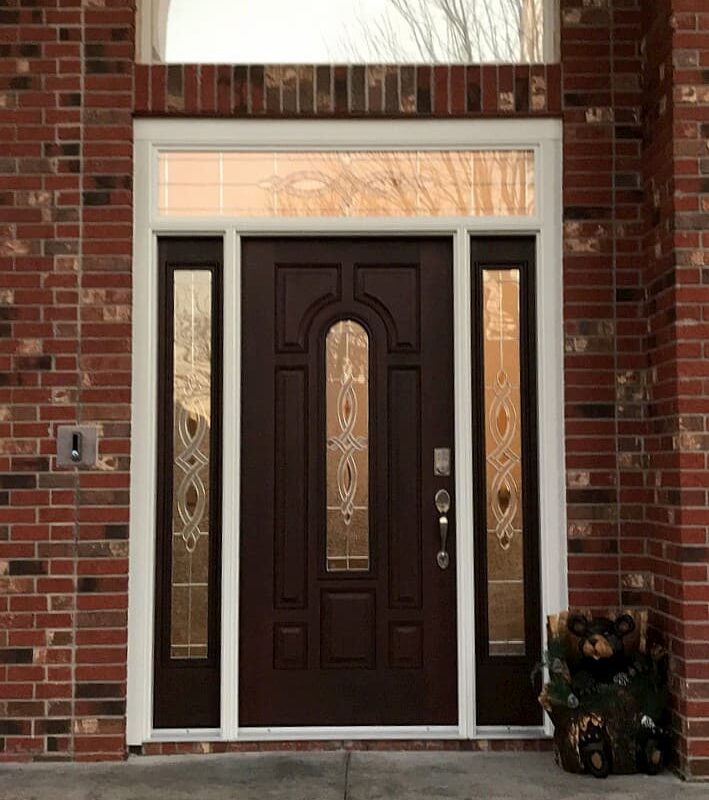 New wood entry door with sidelights and a transom window