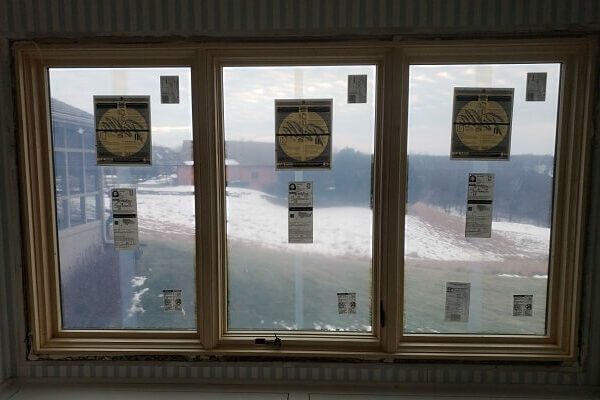 after image of bathroom in omaha home with new wood casement windows