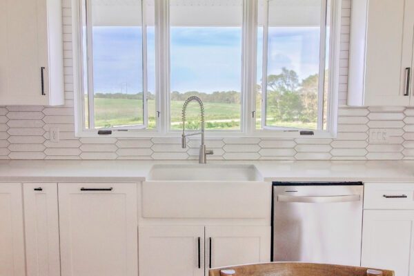 White Pella Lifestyle Series Casement Windows Above Kitchen Sink