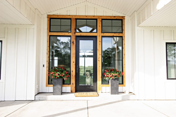Black Pella Entryway with transom windows