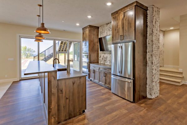 basement kitchen with walk out sliding patio door
