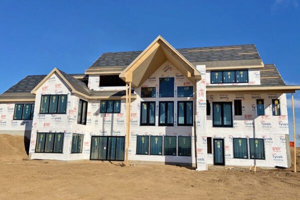 back of walk out ranch with Pella windows