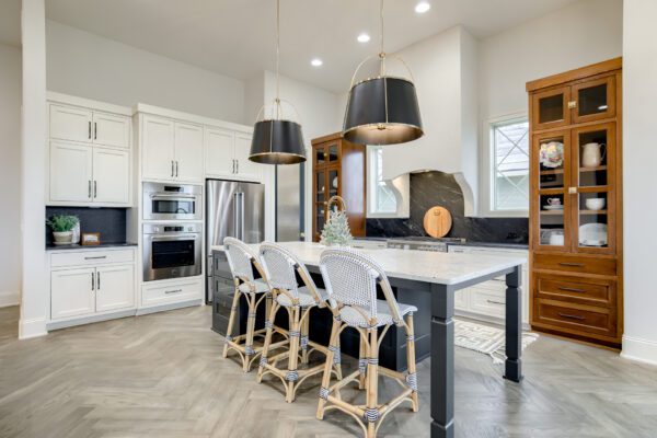 Bright kitchen with grilles between glass windows