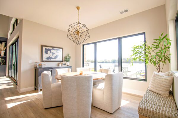 Black Pella Impervia windows in dining nook