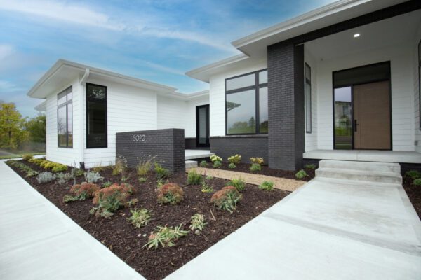 Black Pella Impervia windows in contemporary ranch home