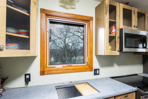 Lifestyle casement blinds between the glass in kitchen