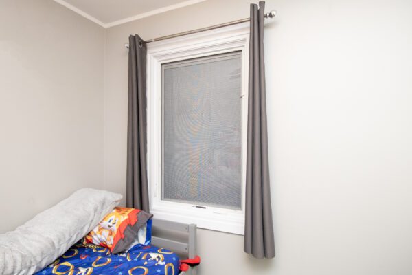 White Lifestyle windows with between the glass blinds in kids bedroom