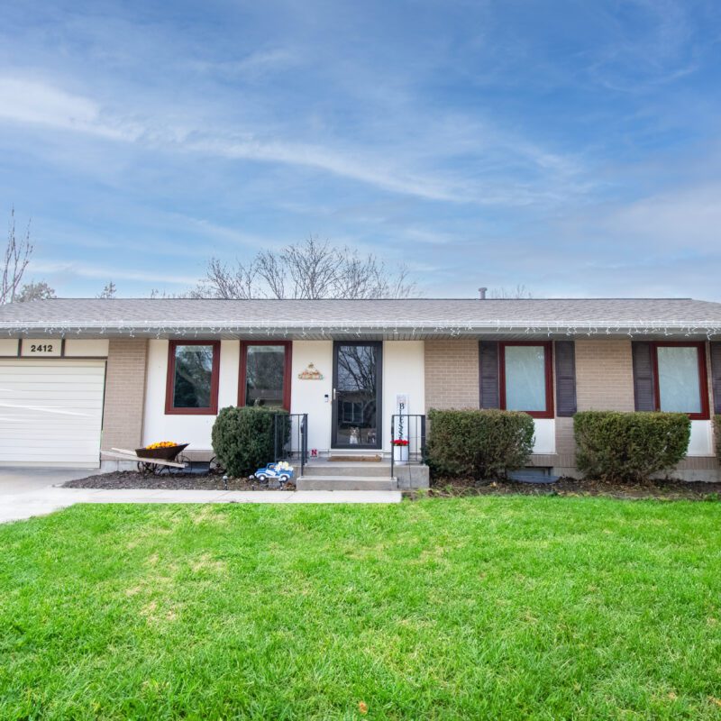 Lifestyle replacement windows on the front of a brick home