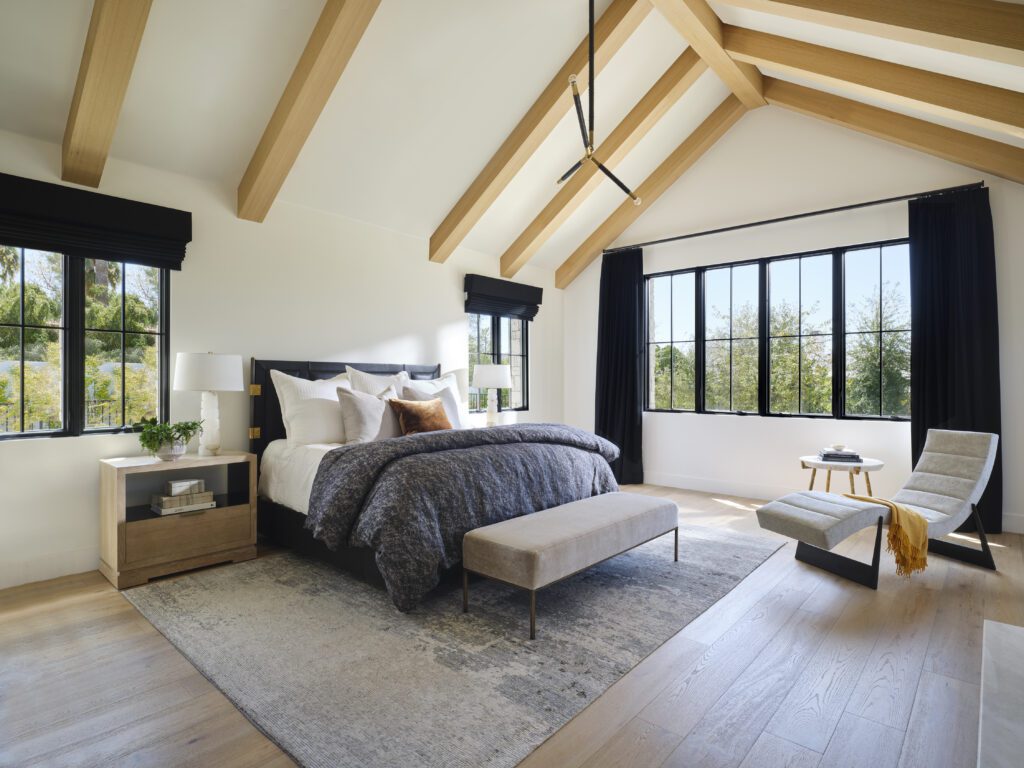 Energy efficient Pella windows with black grilles in bedroom
