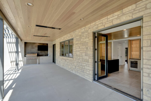 Outdoor living area with Pella double inswing doors