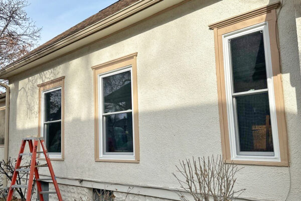 After exterior view of vinyl double hung windows