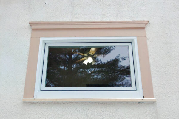 After view of exterior white Lifestyle awning windows