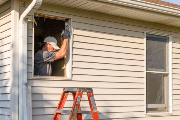 Expert Installer Prepping Opening during replacement