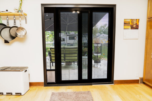 Black Impervia Sliding Patio Door In Kitchen