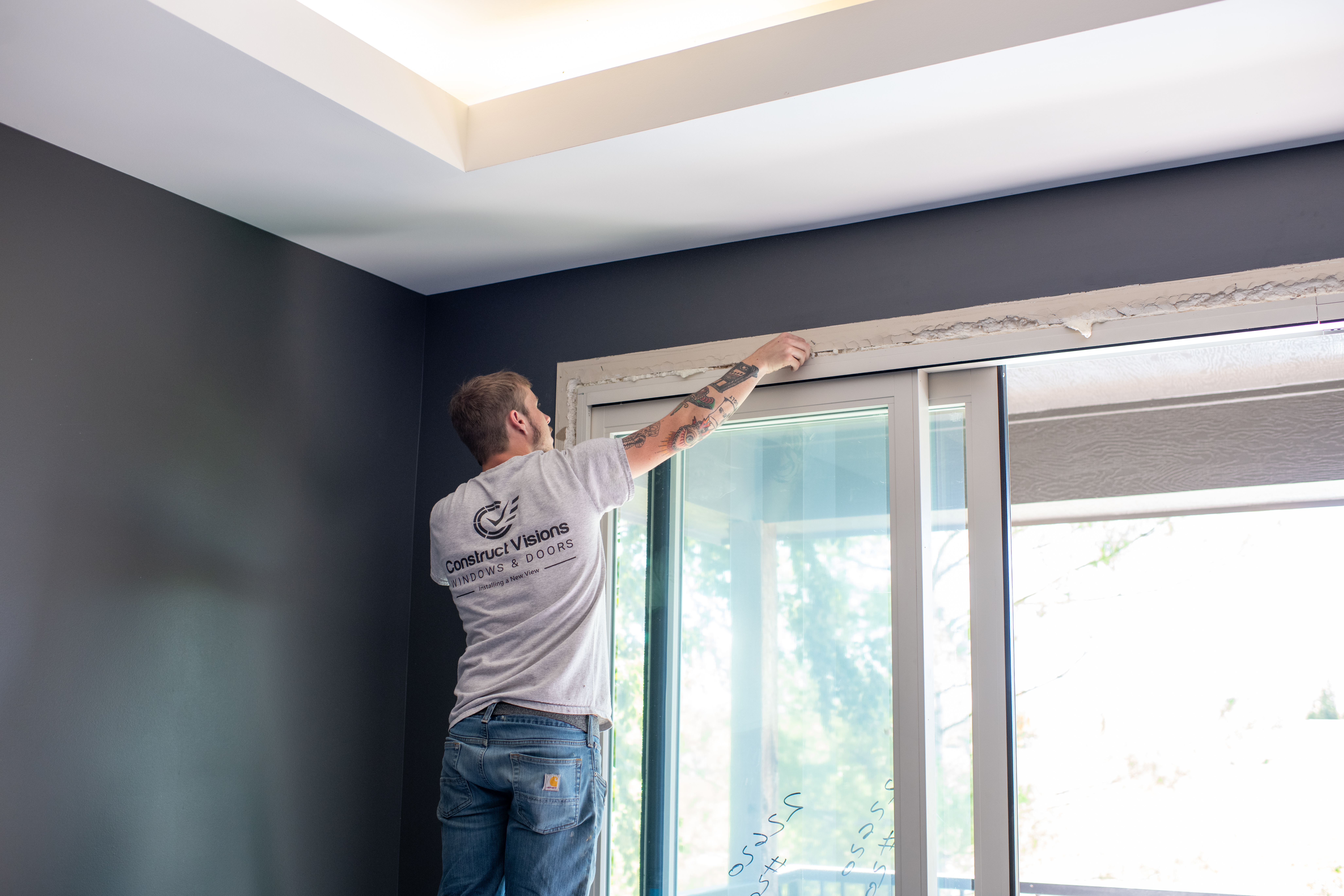 Expert installing patio door