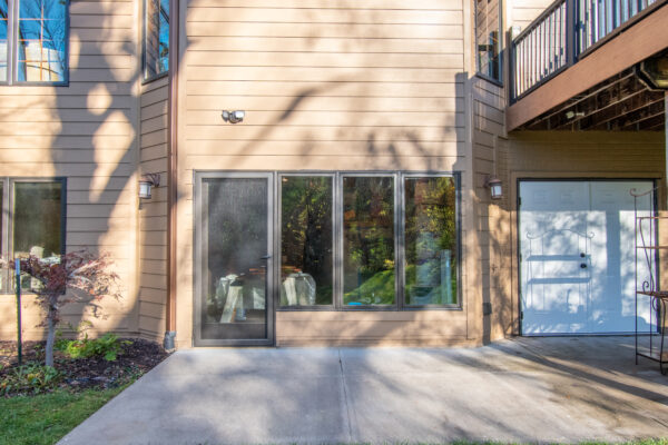 Exterior Pella Lifestyle in swing doors and windows on patio