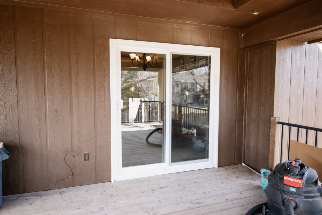 Basement vinyl sliding patio door