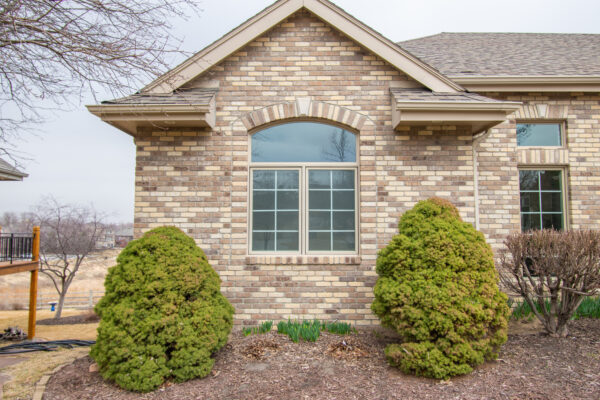 Tan Pella Lifestyle window with grilles