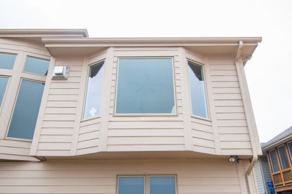 Tan Pella Picture Window on exterior