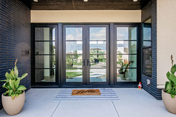 Black Pella Reserve double in swing entry door