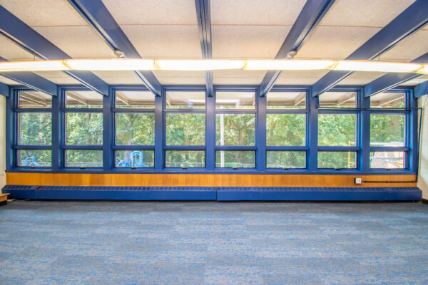 Classroom interior row of blue Pella windows