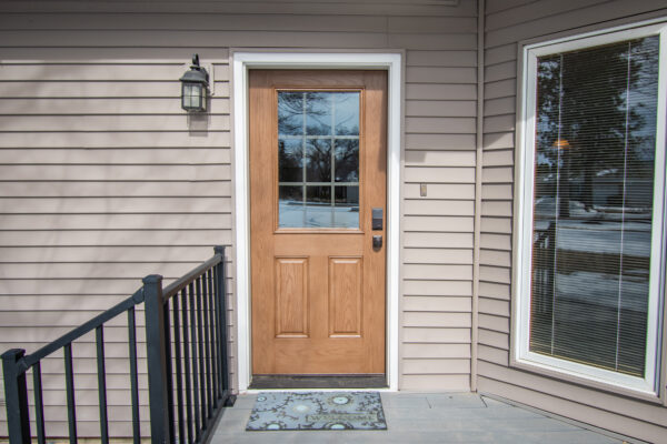 Fiberglass half light door with grilles