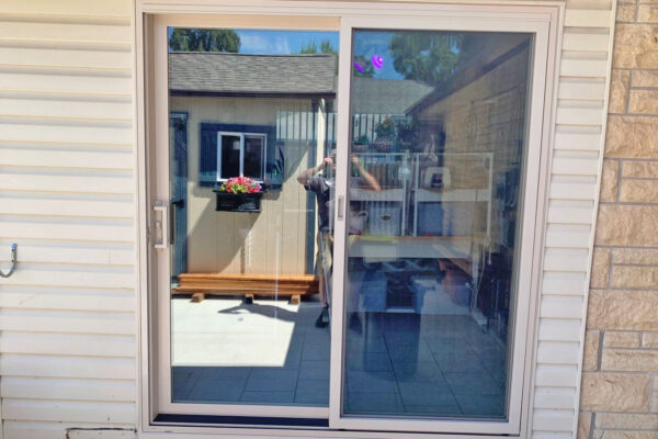 250 Series tan sliding patio door