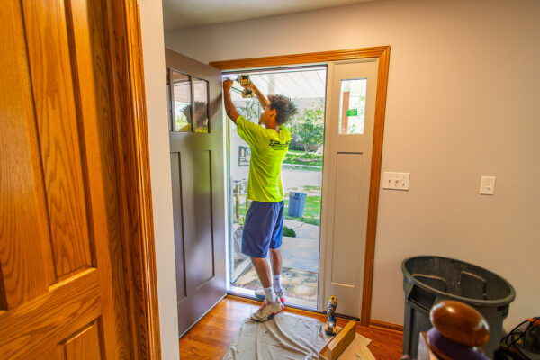 Pella expert installer installing front entry door